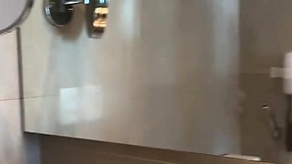 Busty blonde masturbates pussy in a close up photo