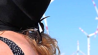 Intense Outdoor Blowjob in Front of Powerful Windmills Till He Cum in Her Mouth