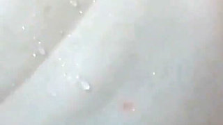 Hot Brunette Squirts in the Bathroom
