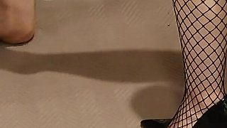 Ballbusting in fishnet stockings