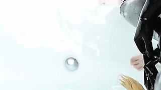 Latexdoll in the Bathtub