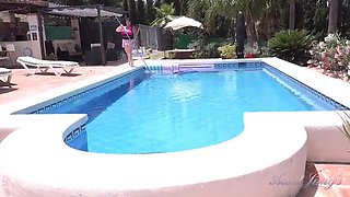 Busty Redhead MILF Jojo Robinson Gets Naked and Fingering Herself by the Pool