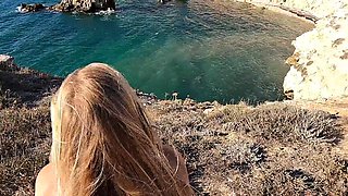 Blonde Milf Flashes Big Tits on Rocks