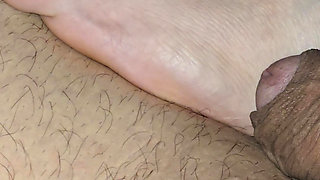 Step mom foot hitting step son cock and handjob