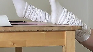 Teacher Caught in College Girl’s Trap, She Touches Dick with Foot Under the Desk and Shows Him Panties, Turning Him Into Her Pet