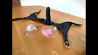 Woman in Open Mouth Mask Tasting Chastity Belt Dildo