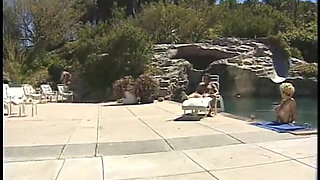 Blond fucking by the pool