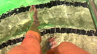Amazon Kandy Flexes Her Massive Biceps in Her Hotel Pool