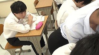 Young Japanese teacher helps her student
