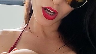 Bodacious brunette beauty plays with her fabulous big tits