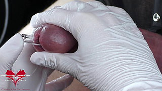 Perfect extraction of sperm directly from the urethra. Close-up of the glass straw sounding.