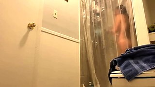 Hidden camera captures sexy stepsister taking a shower