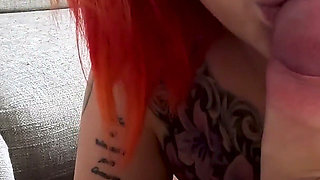 Tattooed Redhead Footjob Fun