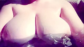 Slutty amateur flashing her big boobs in the backseat