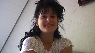 Horny girl lays in bed finger fucking herself and stroking clit