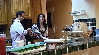 Young cutie has hot fuck in the kitchen with a stud