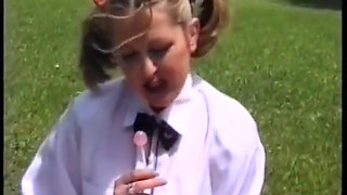 A college girl with blond duvets gets fucked on the lawn.