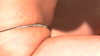 Tattooed slut likes on her back and enjoys licking and sucking her clit