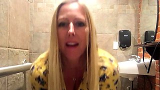 Blonde Big-Tit MILF Vibrates Pussy in a Bar's Restroom!