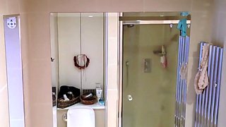 Spying on my gorgeous showering stepsister