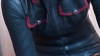 Latex Danielle plays in latex costume with his cock