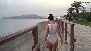 Naughty MILF Lada Flashes Wet See-Through Swimsuit at Beach