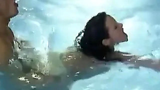 Busty German MILF Takes a Hard Pool Fuck