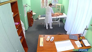 Doctor prescribes an erotic massage for sexy blonde patient