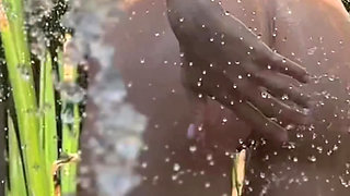 striptease under running water and masturbation with beautiful fingers