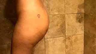 Busty curly brunette with big boobs fucks on couch