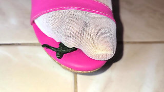 Giant Humiliates Tiny Man with His Feet and Stockings