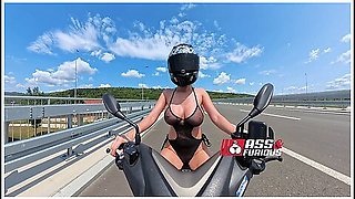 Riding Motorcycle In See Through Beach Wear