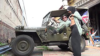 A horny soldier groped a  woman in a hijab