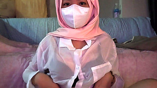 A Cute Petite Hijabi Doing Porn
