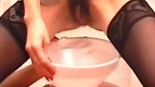 A Horny Whore Using a Strap-on