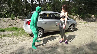 Suited slave gets punished outdoor from femdom chick