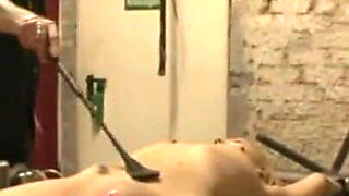 Petit girl stretching, candle dripping