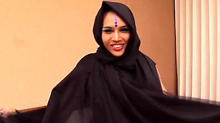 Asian shemale in Arab outfit teases with her 9-inch dick