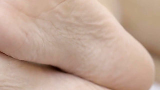 Busty Blonde MILF Slowly Oils Her Soft Feet