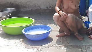 Stepsister desi in beautiful red tights is bathing completely naked in the open bathroom in the stepsister red tights
