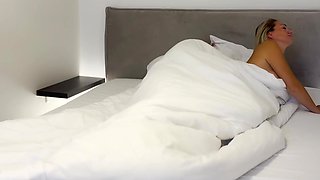 Busty girls share one's boyfriend's cock in bed