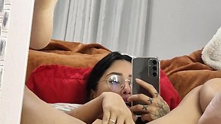 Wet Latina solo play with intense hand action and moans