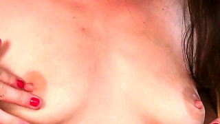 Sweet brunette Tilly McReese plays with a dildo