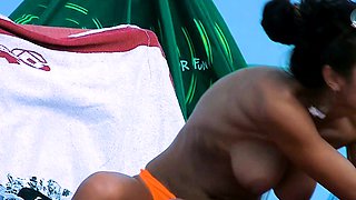 Nudist teen is filmed outdoors