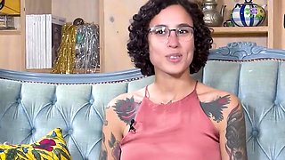 Tattooed black-haired masturbates with her fingers